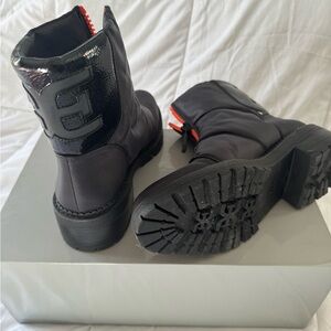 Black Boots with Red Zipper Detail